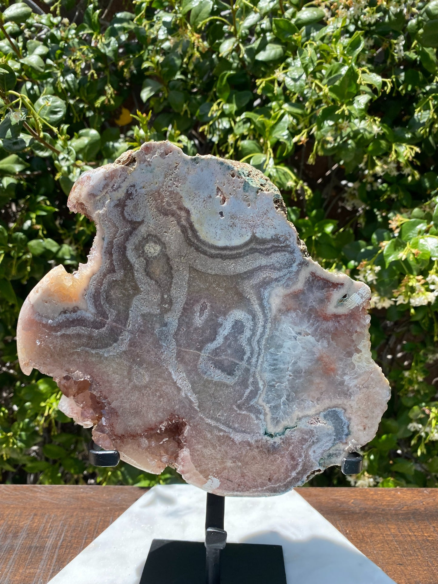 Pink Amethyst Slab with druze on stand